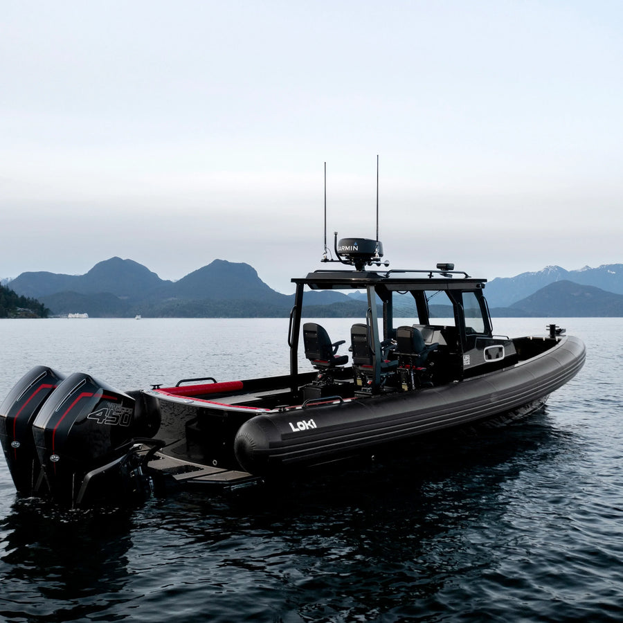 Loki RB-10 RIB Boat with Seaview mount on water with mountainous background.