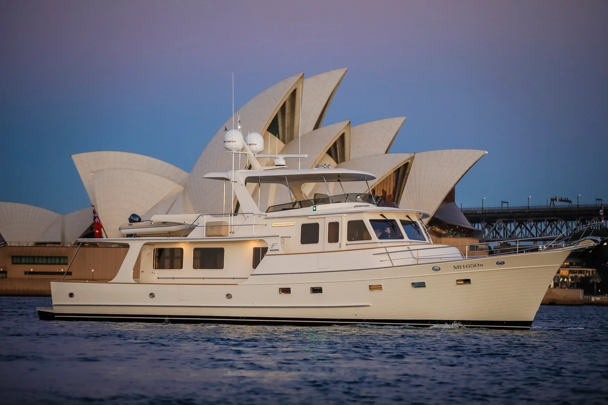 Fleming 65 yacht with custom Model #72 mast in front of Sydney Opera House.