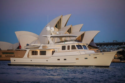 Fleming 65 yacht with custom Model #72 mast in front of Sydney Opera House.
