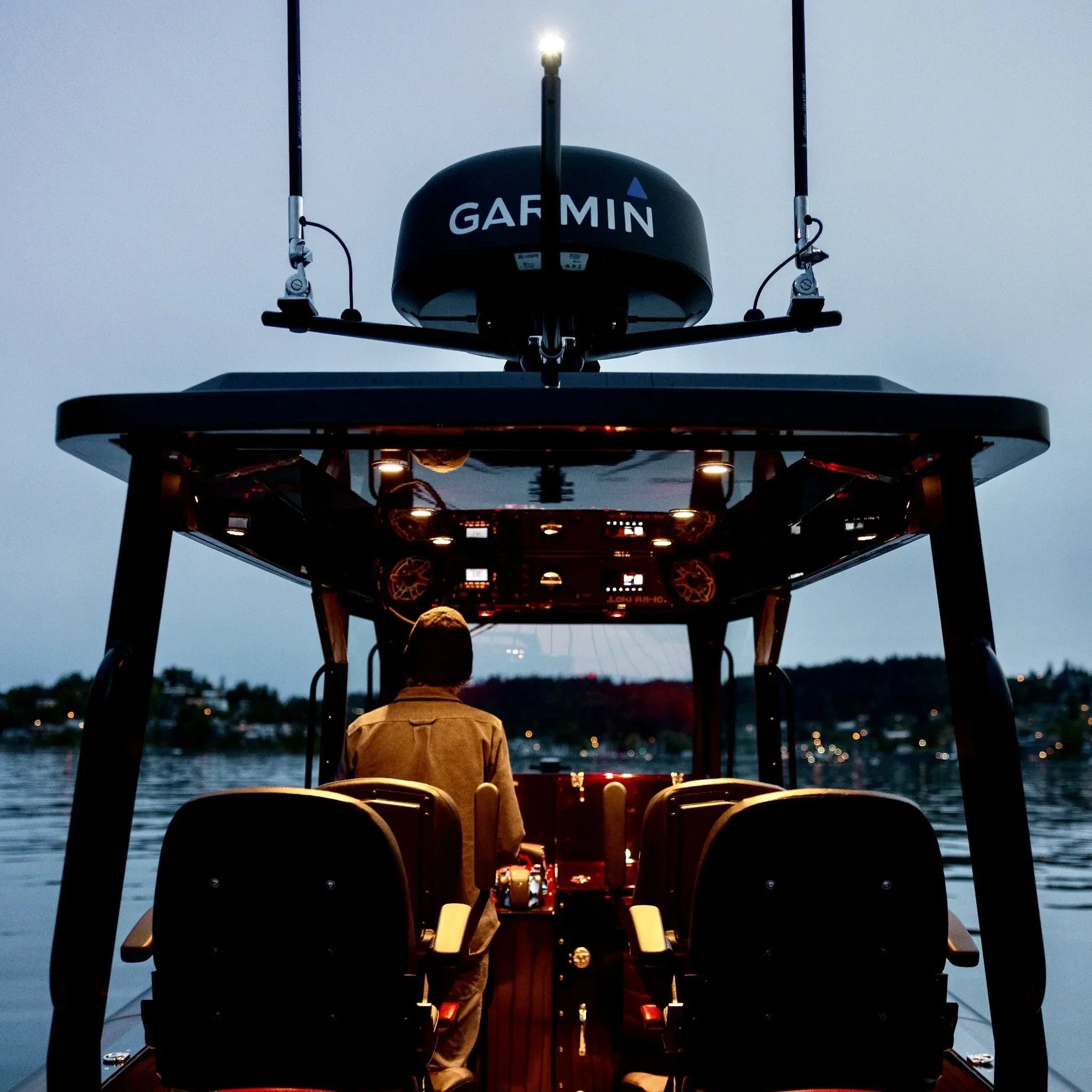 Loki RB-10 boat with marine electronics on Seaview mount cruising at twilight.