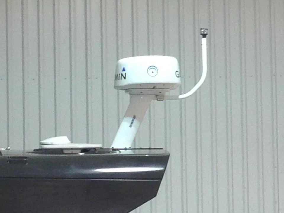 Seaview electrically actuated hinge base installed on a boat.