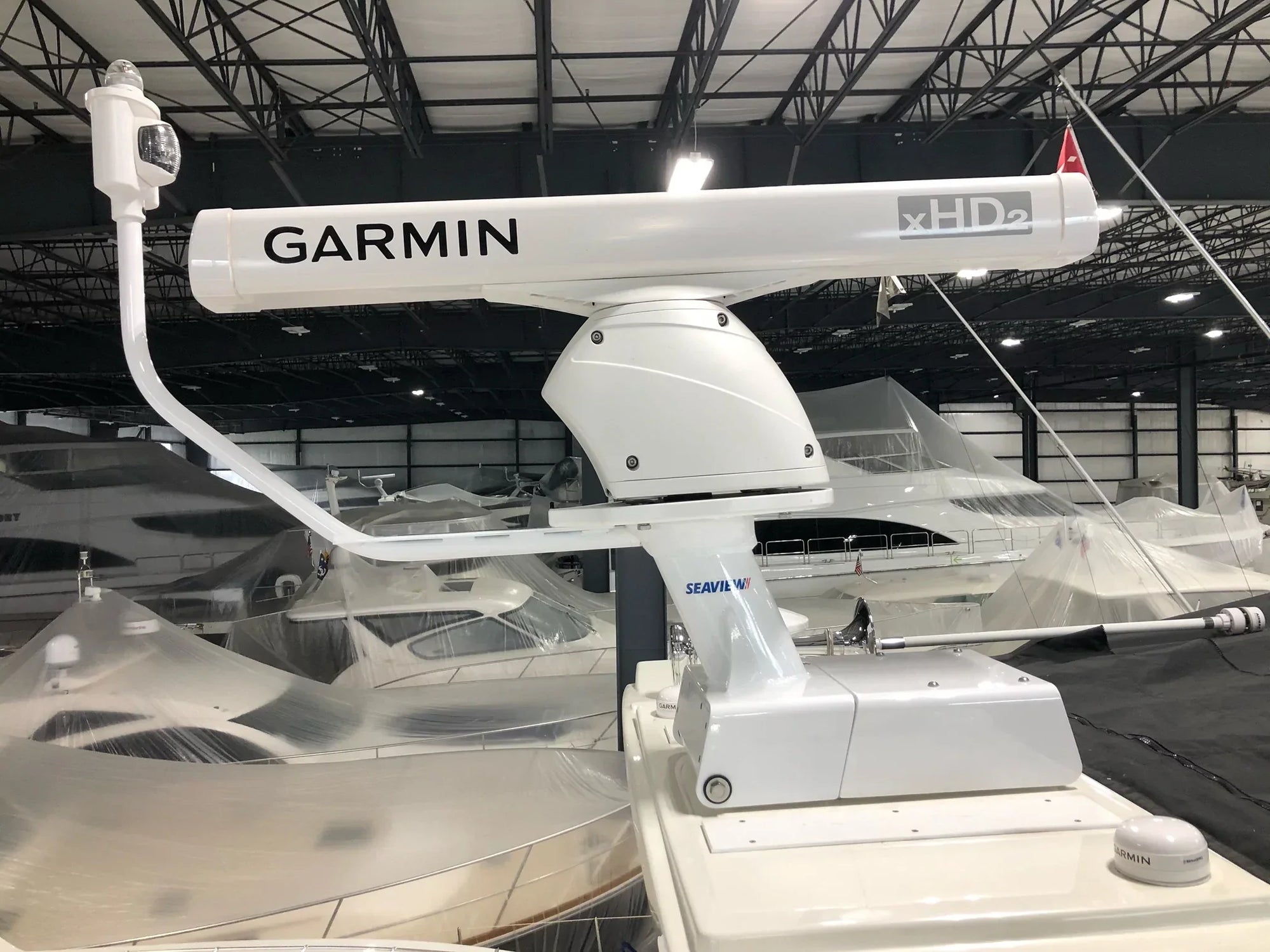 Electrically actuated hinge base Model #68 installed on a boat.