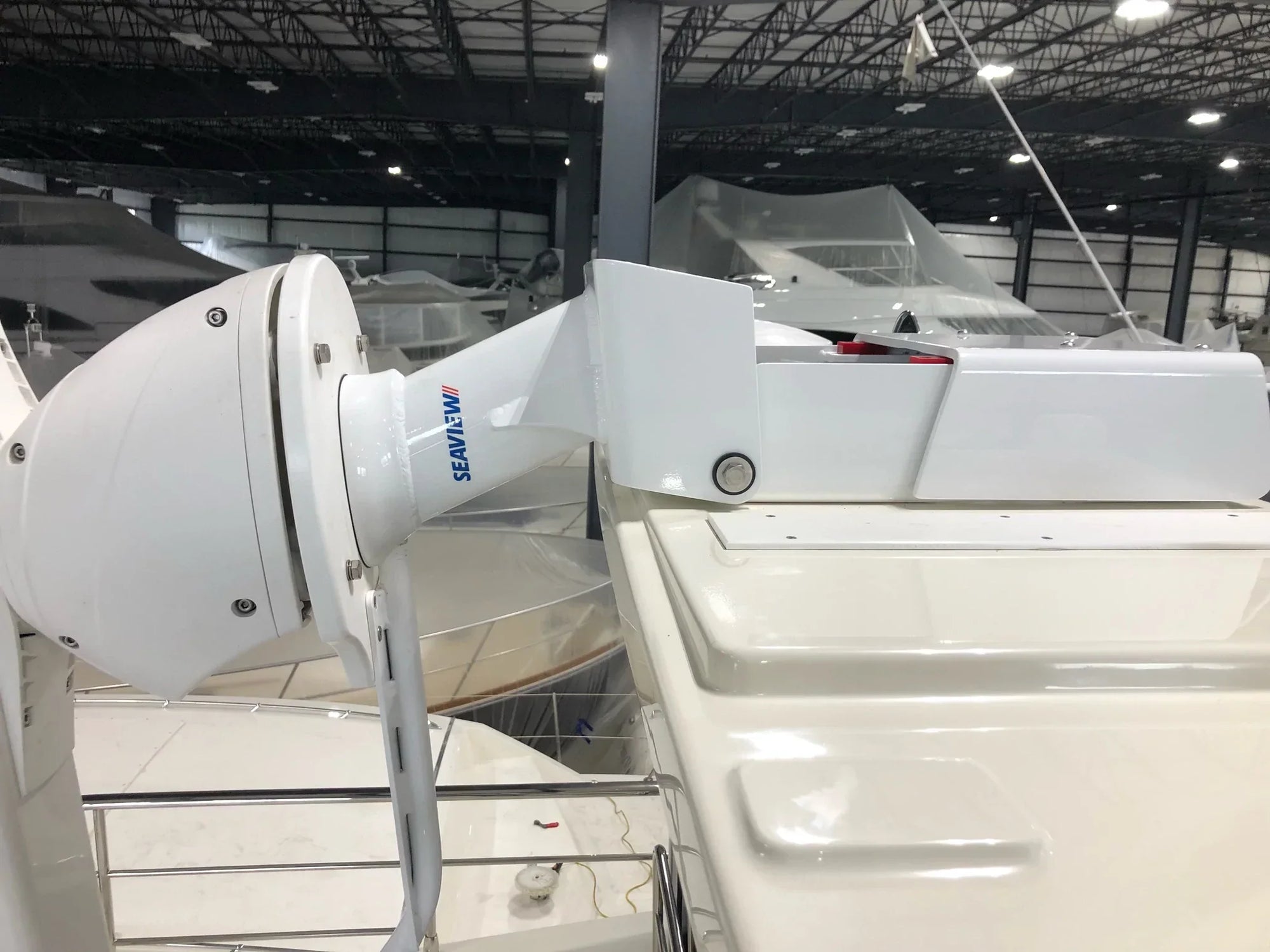 Seaview electrically actuated hinged base on a boat.