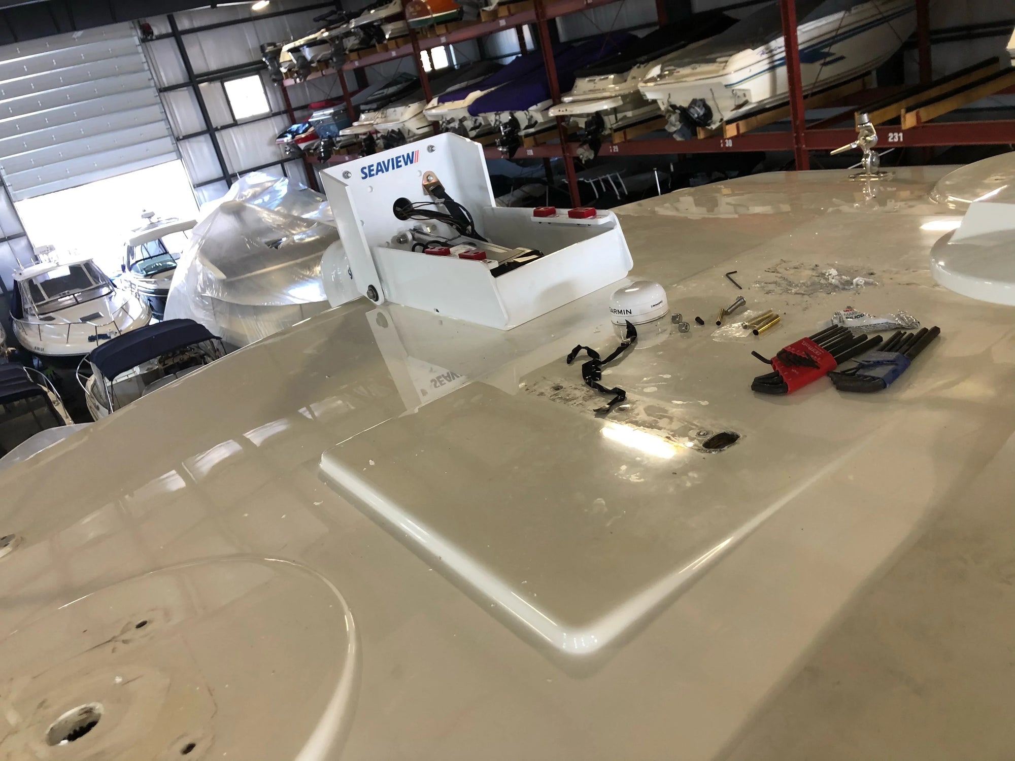 Seaview electrically actuated hinge base on a boat deck.