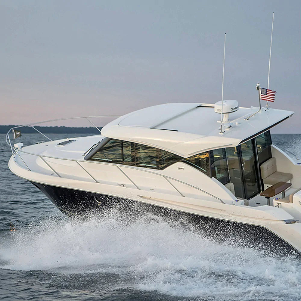 Luxury Tiara Yacht cruising on open water with Seaview marine electronic mount